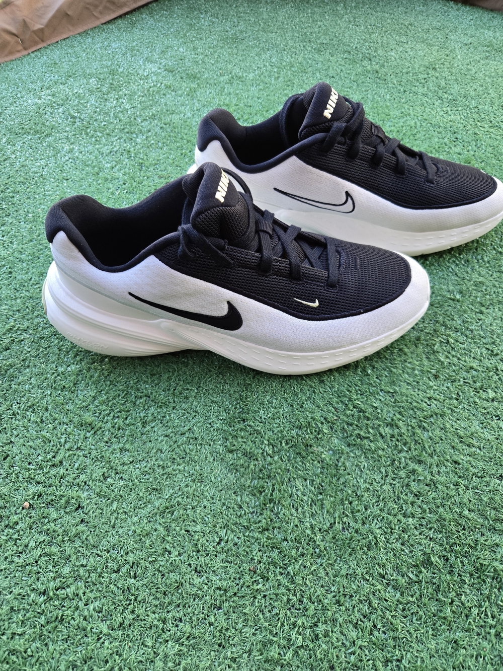 Nike Uplift SC sneakers in the Sail/Black-Life Lime colorway